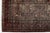 This exquisite antique hand-knotted wool rug showcases striking Caucasian-inspired geometric medallions rendered in a...