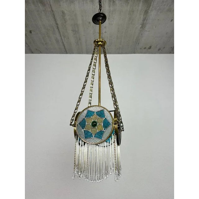 Brass jugendstil hanging lamp in excellent condition. Up to 250V (Europe/UK Standard).The wiring of this item may be...