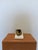 Abstract patinated bronze sculpture by unknown Brazilian artist on a white stone base circa 1990s. Piece has a signature,...