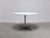 Nice round table produced in Germany around 1975. It has a round top in white formica and a central pedestal base in...
