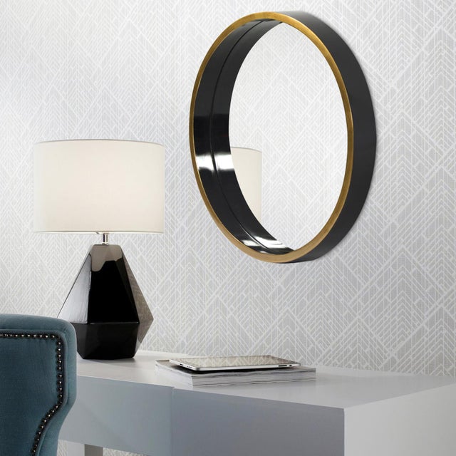 Our Brando Mirror is a simple piece. It features a simple round frame that is deep like a shadowbox and finished in a...