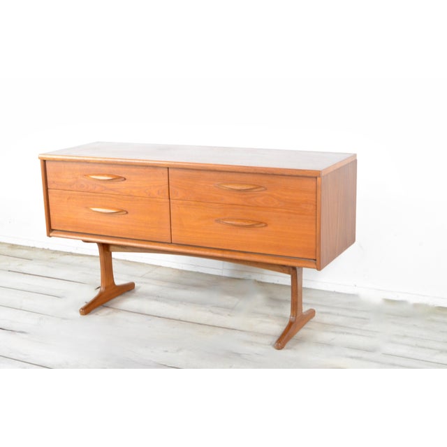 Vintage Sideboard in Teak by Frank Guille for Austinsuite, 1960s, in Very Good conditions. Designed 1960 to 1969 I have...