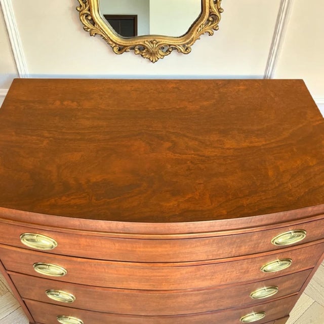 This White Fine Furniture chest from the 1960s features beautifully figured mahogany with soft flame patterning creates a...