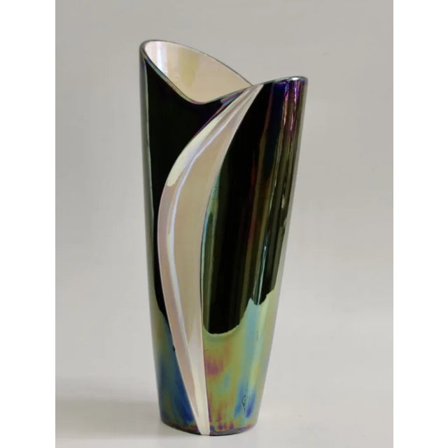 This blue and beige iridescent vase was made in the Verceram factory in Montreuil near Paris in the 1960s. This piece has...