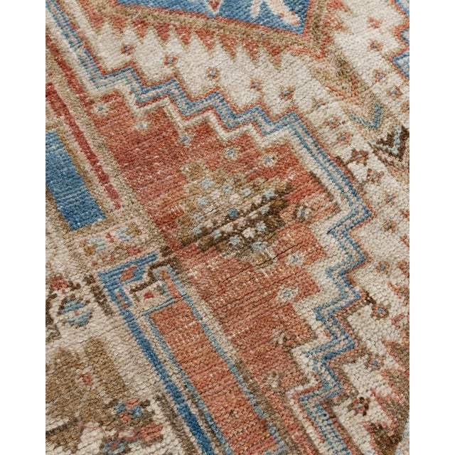 A beautiful hand-knotted rug, traditionally crafted by skilled artisans using fine-quality wool. The hand-knotted...