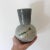 Such a beautiful pot. This vase would make a great accent in your home. The colour is ombré blue grey. The flower motif is...