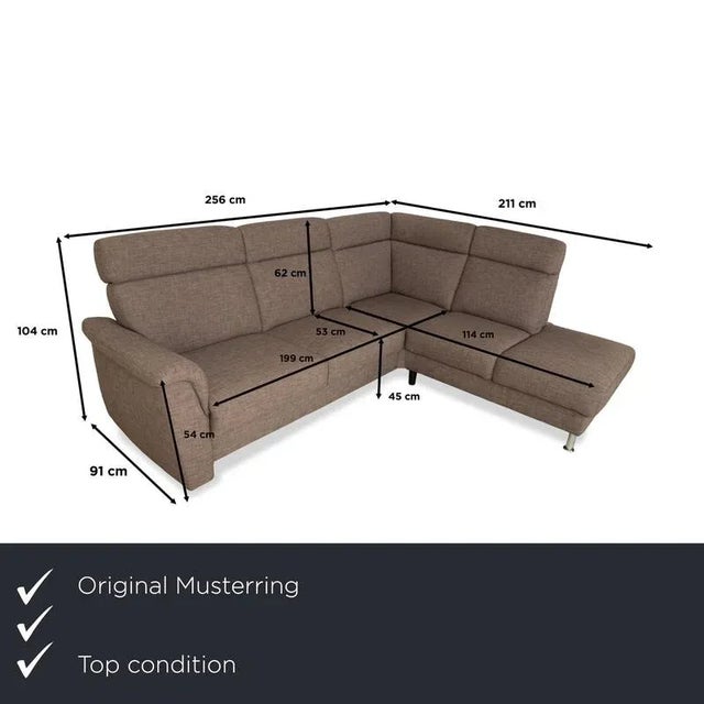 The Musterring corner sofa is crafted from high-quality fabric, ensuring both comfort and durability. The gray-brown color...