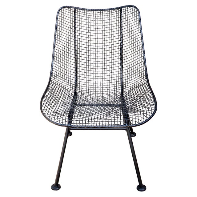 A fantastic patio set attributed to the iconic mid-century Woodard Sculptura design collection. This striking five-piece...