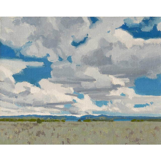 "Under Open Skies" is an oil on mounted linen landscape painting by Michael Magrin, completed in 2025. Cumulus clouds fill...