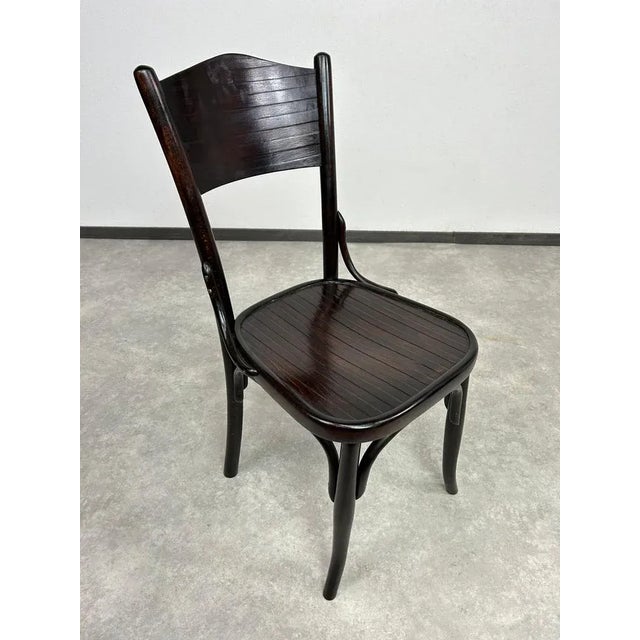 Beech bentwood dining chair by Thonet Uzhhorod Czechoslovakia. Professionally stained and repolished. This piece is...