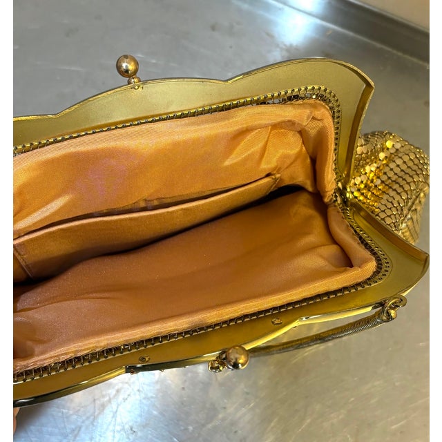 1950s gold metal mesh snap-top evening bag/purse w/ rhinestone detail at top and hideaway strap. Excellent condition.