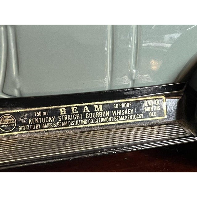 For the Whisky connoisseur, a vintage Jim Bean Bourbon Decanter with sealed contents, the decanter a highly detailed Ford...