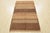 A contemporary Moroccan rug handwoven with fine wool on a cotton foundation. This flat-woven area rug features areas of...