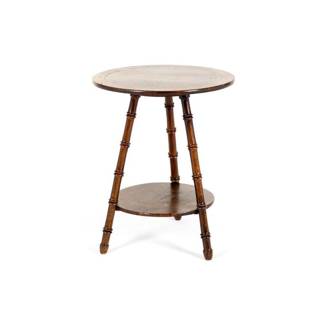 A superb late 19th century olive wood occasional table by renowned furniture maker william gerrard of lyndhurst. The table...