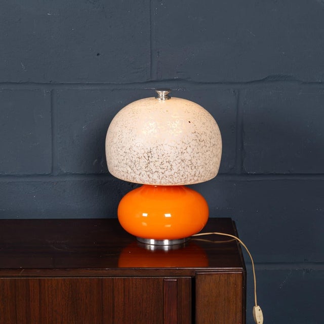A striking Murano glass mushroom table lamp produced in Italy during the 1970s, embodying the playful organic forms and...