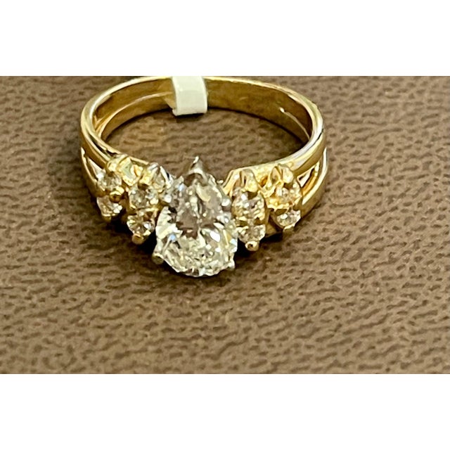 1 Carat Center Diamond Engagement 14 Karat Yellow Gold Ring 14 K gold Stamped 4.5 Grams Diamond VS quality and G/H color....