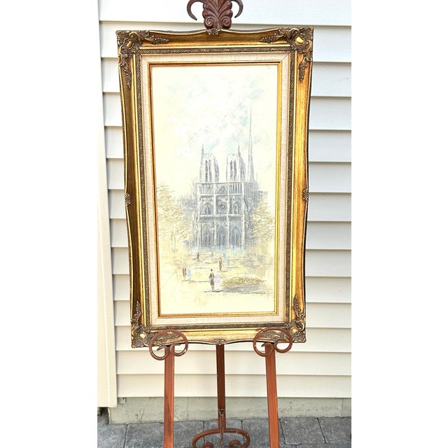 Such a tranquil, overcast day, in front of the Notre Dame Cathedral, in Paris. The smartly dressed pedestrians are...