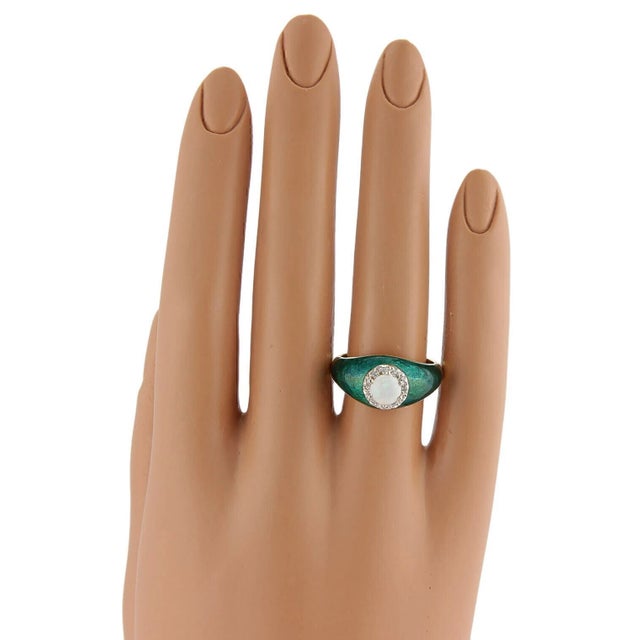 This Opal Diamond & Green Enamel 18k Yellow Gold Cocktail Ring in size 8 is a stunning piece of vintage and antique...