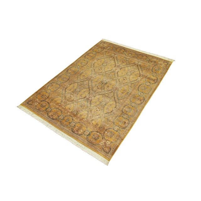 Designed with mesmerizing intricacy and gorgeous color palette, this hand-knotted masterpiece demonstrates the beauty and...