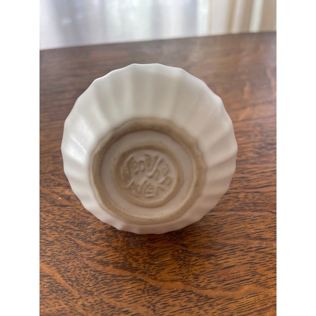 Jonathan Adler small sculptural vase in white.