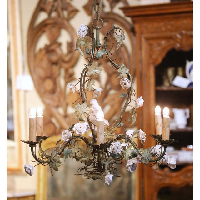 Decorate a breakfast room, powder room, bedroom, or entry with this charming antique French floral chandelier. Crafted in...
