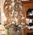 Decorate a breakfast room, powder room, bedroom, or entry with this charming antique French floral chandelier. Crafted in...