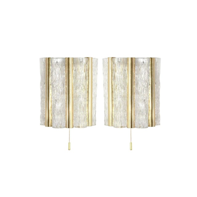 Meticulously restored Murano Glass and Brass Sconces by Doria Leuchten, crafted in Germany circa the 1960s. These elegant...