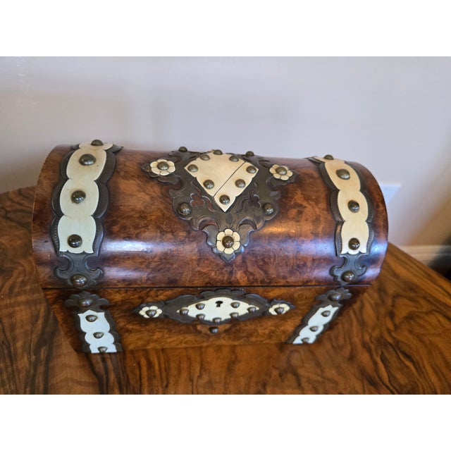 A beautiful Victorian walnut burl tea caddy. Beyond storage, tea caddies historically served as a symbol of sophistication...