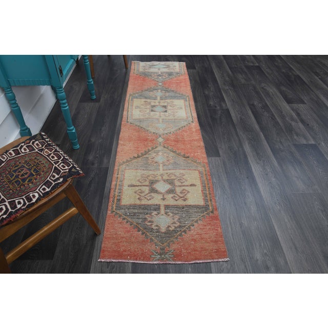 Vintage Hand-Knotted area rug is a semi-antique vintage area rug. The '70s Eastern region of Anatolia's unique rug is...