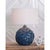Organically shaped and glazed in various tones the Lucia lamp is reminiscent of the beach. Multiple hand-crafted, pinched...