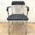 Vintage navy chair rendered in aluminum frame and original perforated vinyl upholstery by Emeco, original contract piece...