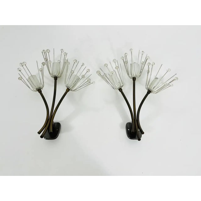 A beautiful pair of brass wall lamps made by Emil Stejnar for Rupert Nikoll, Austria in the 1960s. The pair has an amazing...