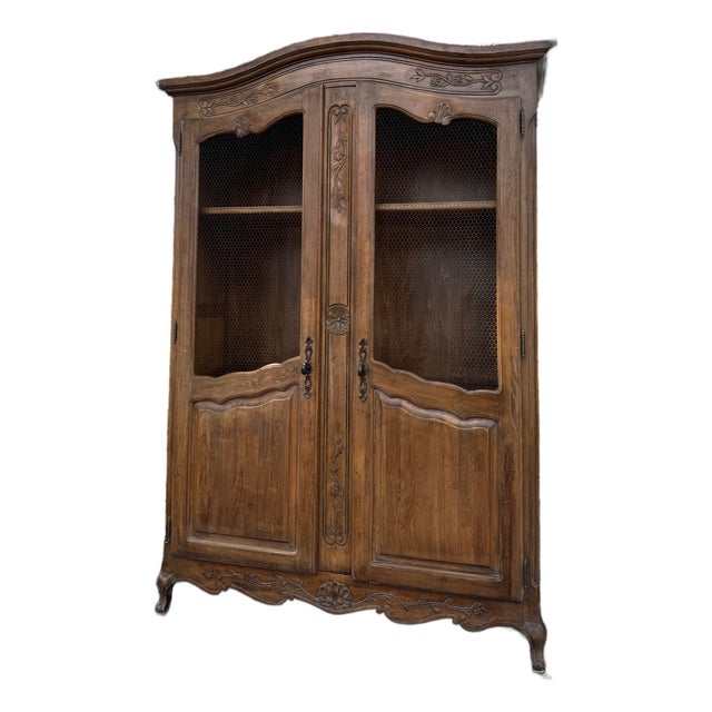 Vintage French Provincial Carved Wood Armoire With Chicken Wire Doors For Sale