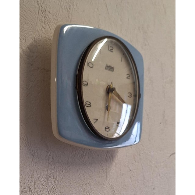 Mid-Century German Wall Clock with Ceramic Case from Hettich, 1950s, in Very Good conditions. Designed 1950 to 1959 This...