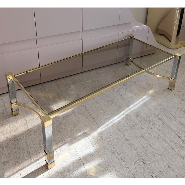 Large 1970s Hollywood Regency chrome & gold coffee table with inset smoked glass top. Some minor age-related patina to the...