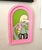 Zombie by Katie Mansfield | Acrylic on wood depicting a zombie woman with pink hair and a skeleton shirt. For Sale - Image 4 of 4