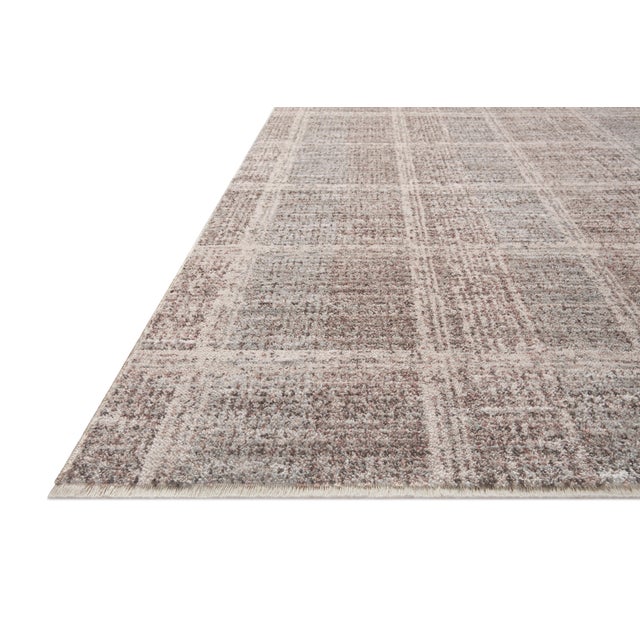 The Ember Collection by Angela Rose x Loloi is a modern flatweave area rug with a timeless plaid pattern that adds depth...