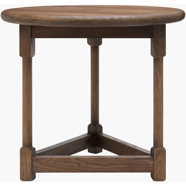 Elevate your living space with the charming Leandro End Table, a perfect blend of rustic elegance and practical design....