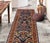 Enhance the ambiance of your home with this magnificent Persian-influenced Turkish hand-knotted rug made by skilled...