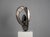 A striking abstract sculpture by british artist lea goodman, created in the 1980s and executed in polished stainless...