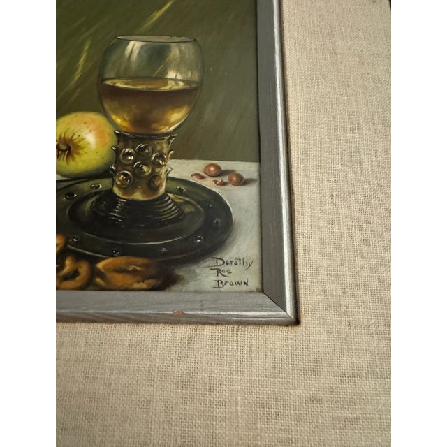 Dorothy Roe Brown Oil Painting on Board – Framed Still Life of Wine Bottle & Apple This beautifully detailed oil painting...