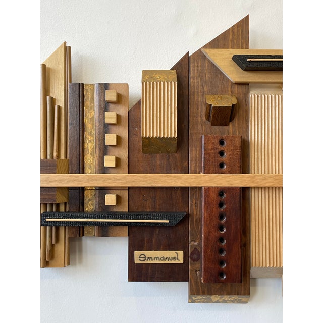 ✨A sculptural statement piece that blends architecture and art, layered woods, bold geometry, and incredible depth from...