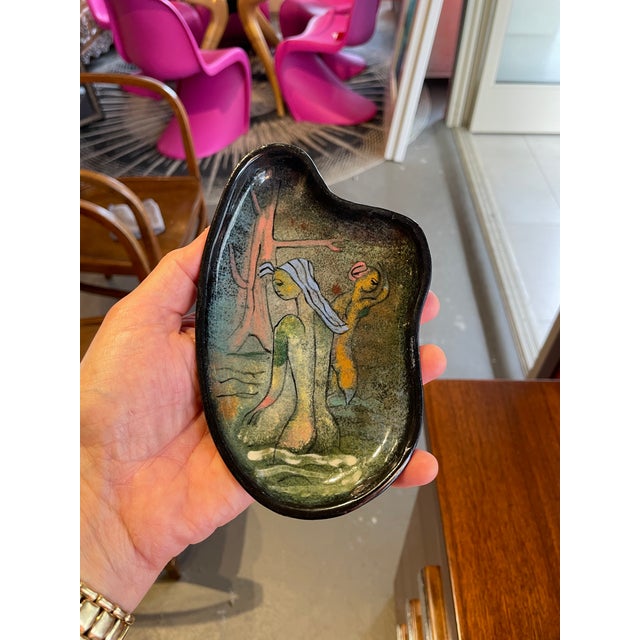 Polish-born Polia Pillin used engobe and glaze techniques to create mid-century motifs painted onto hand-thrown pottery...