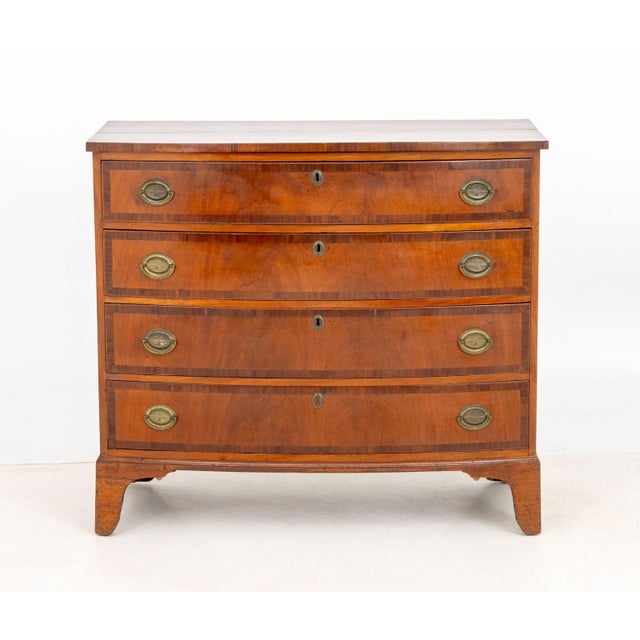 George III Style Fruitwood Chest of Drawers, with four drawers on bracket feet. 36.25" H x 41" W 21.25" D. Provenance:...