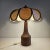 Very nice table lamp, fabricated in The Netherlands in the 70's. The elegant shape makes it look like a palmtree. The base...