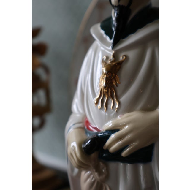 A commanding vintage Chinoiserie ceramic Emperor figurine attributed to Holland Mold and individually hand-painted in a...