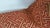 From Kravet Smart is a red and gold fretwork pattern lumbar pillow cover. The gold catches the light and brings out a...