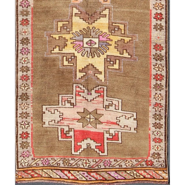 Tribal Vintage Turkish Kars Runner With Brown, Red, Yellow, and Soft Pink Tones For Sale - Image 3 of 13