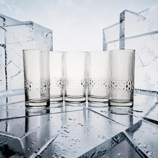 Manufactured by Durobor of Belgium, this set of five Alaskan pattern highball tumblers reflects the company's reputation...
