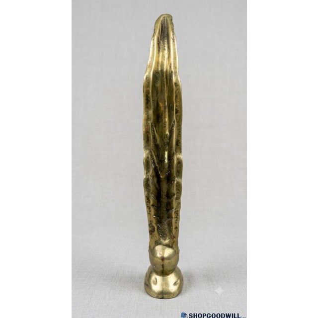 A striking 1980s Art Deco Revival solid brass stylized swan sculpture designed by Dolbi Cashier. This elegant piece...